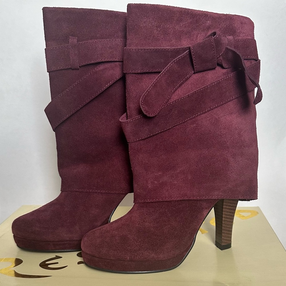 Wine colored booties. Comfortable heel. Leather upper material.